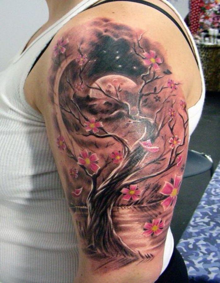 大臂彩色的桃花树和风景纹身图案