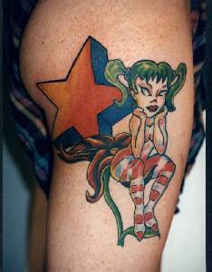 腿部彩色小女孩与五角星纹身图片