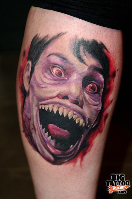 小腿惊人的彩色僵尸怪物脸纹身图案