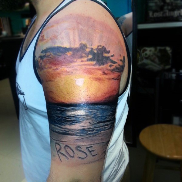 手臂浪漫的彩色海洋日落风景纹身图案
