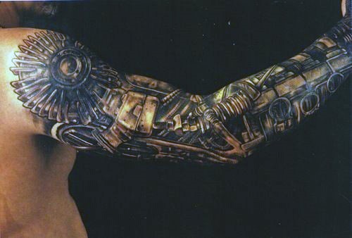 花臂彩色惊人的机械手纹身图案
