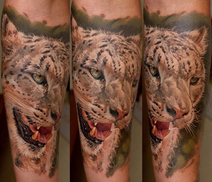 手臂逼真的现实主义风格豹头纹身图案