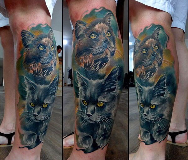 小腿插画风格的彩色猫纹身图案