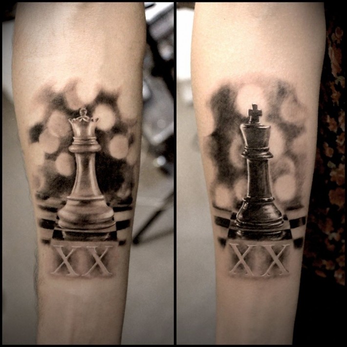 手臂现实主义风格的国际象棋人物纹身