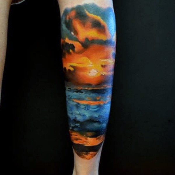 小腿浪漫的彩色海洋日落纹身图案