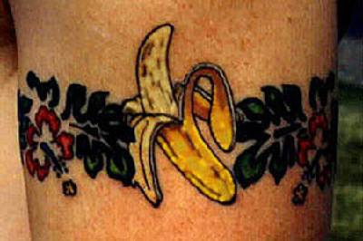 手臂彩色香蕉花朵纹身图案