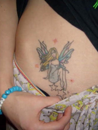 女生腹部漂亮的精灵和星星纹身图案