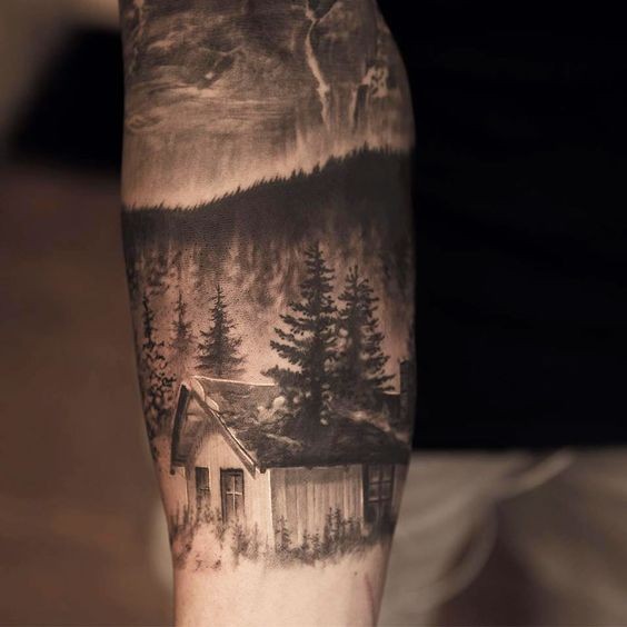 手臂现实主义风格的森林房子与夜空纹身
