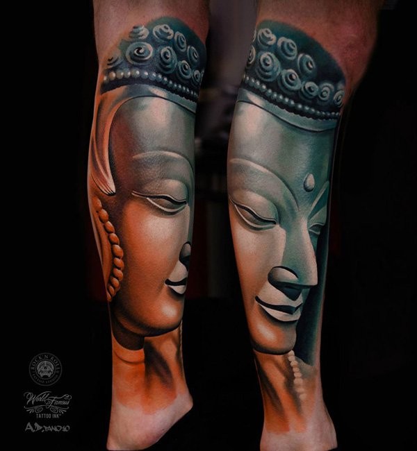 腿部彩色逼真的如来佛祖雕像纹身图片
