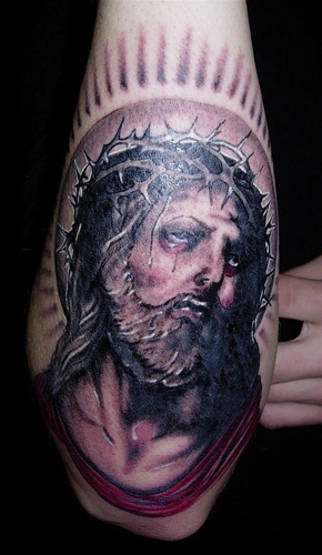 手臂折磨耶稣头像纹身图案