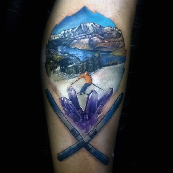腿部彩色滑雪男子与冬季森林纹身