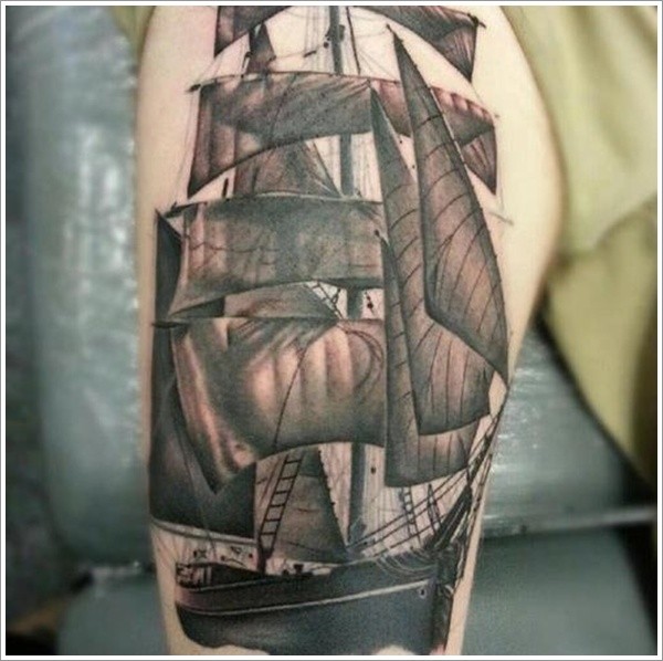 腿部黑棕色帆船纹身图案