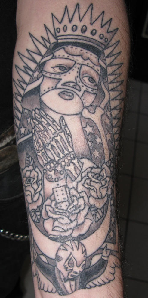 手臂墨西哥风格的圣人图标纹身图片