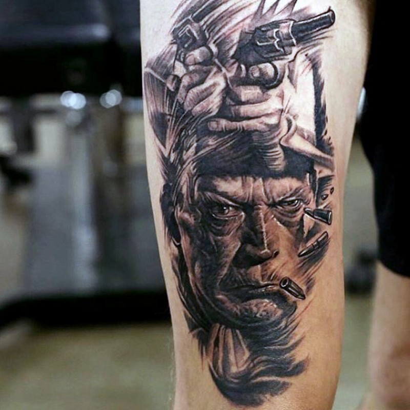 手臂黑棕色老西部主题的电影英雄纹身图片