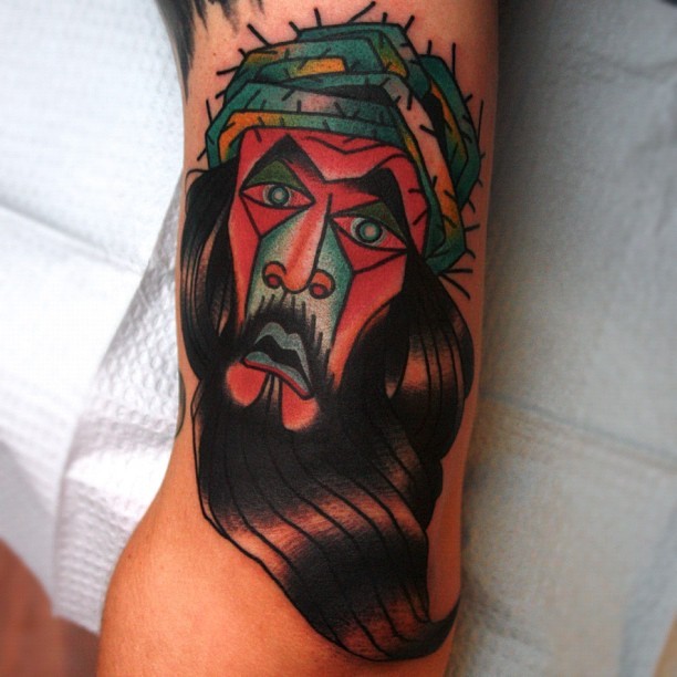 腿部彩色耶稣肖像纹身图案