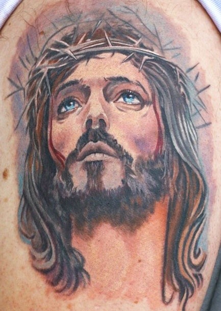 肩部水彩画耶稣肖像纹身图片