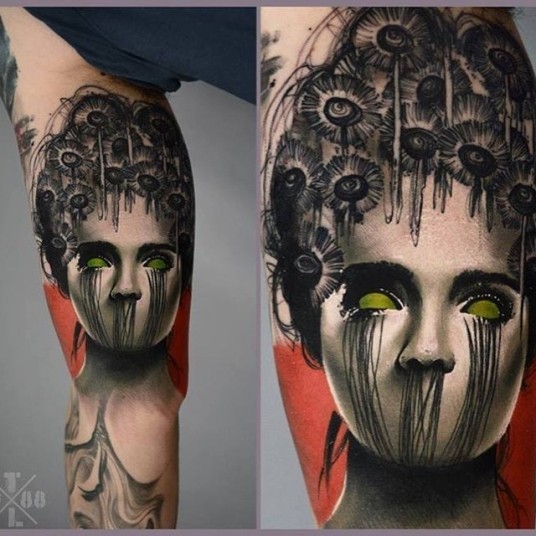 手臂彩色恶魔的女人肖像纹身图片
