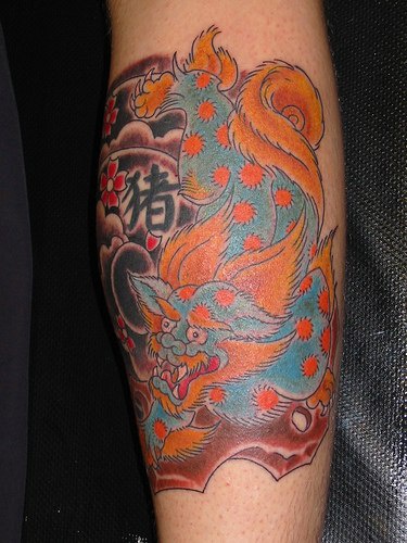 手臂彩色东方风格的狮子纹身