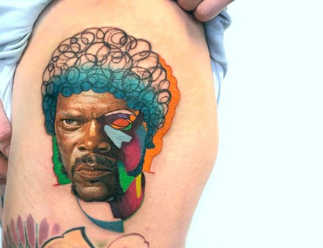 腿部彩色塞缪尔·杰克逊肖像纹身图片