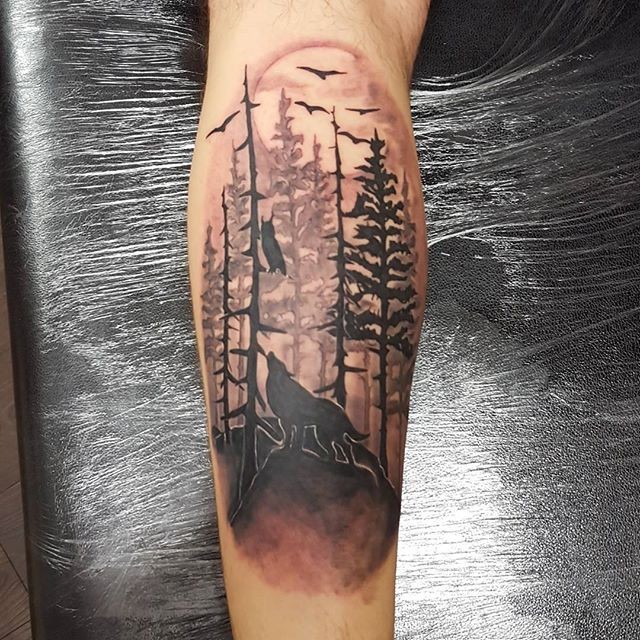 腿部棕色森林与动物纹身图案