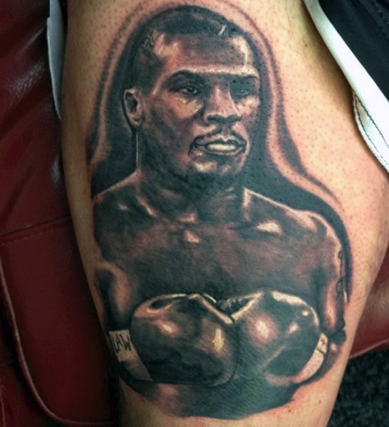 腿部著名拳击手肖像纹身图案