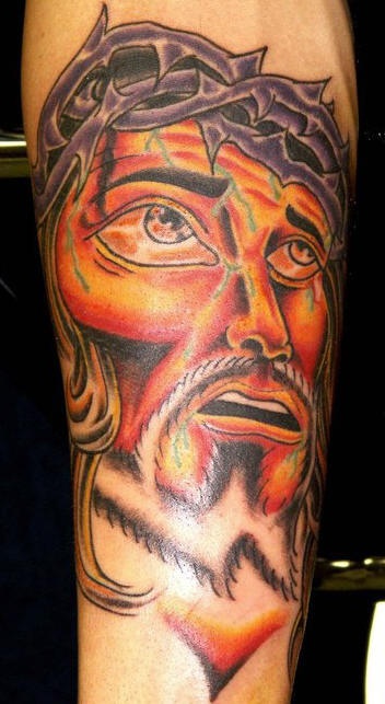 手臂彩色超现实的耶稣肖像纹身