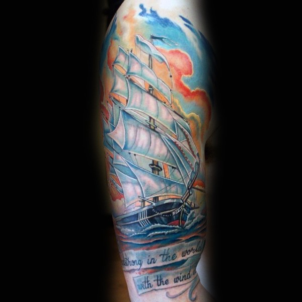 腿部彩色的旧船与字母纹身图片