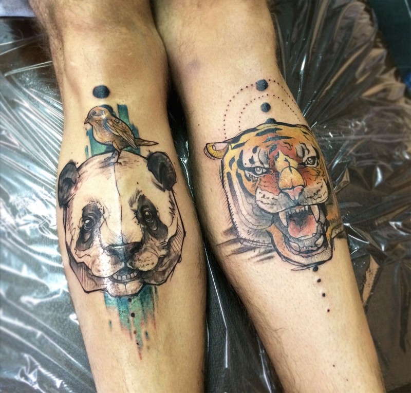 手臂彩色老虎和熊猫头纹身图案