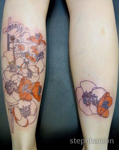 女性腿部彩色各种花卉纹身图案