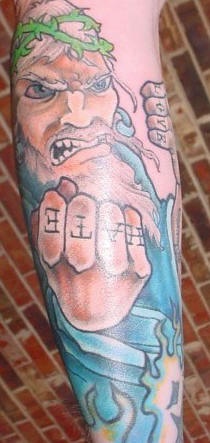 腿部发怒的耶稣头像纹身图案