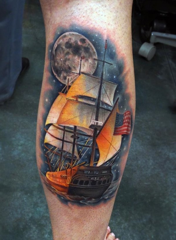腿部彩色帆船与夜空纹身图案
