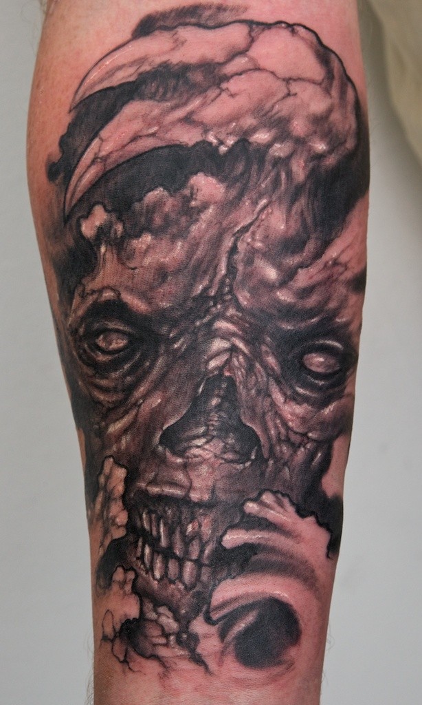 手臂棕色丑陋的怪物骷髅纹身图片