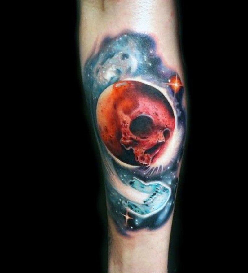 腿部彩色骷髅与行星纹身图案