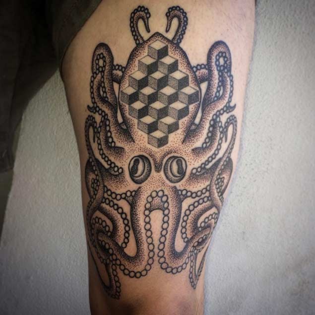 腿部黑棕色章鱼与几何图形纹身图案