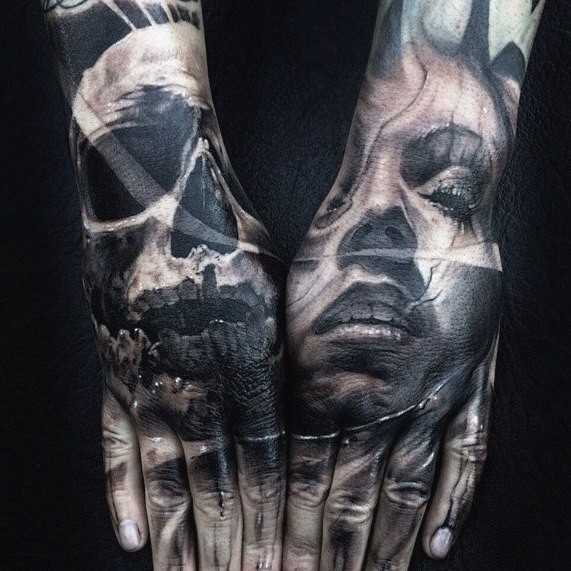 手部恐怖风格神秘女人与骷髅纹身图片
