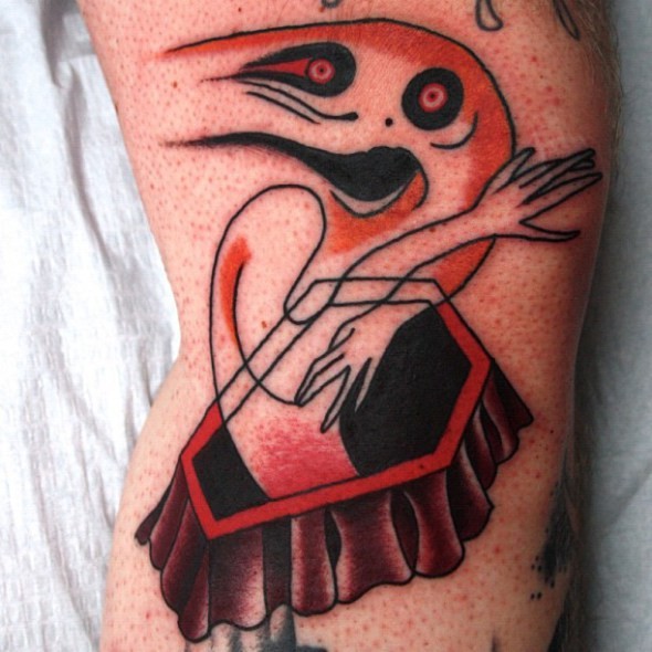 腿部彩色个性的橙色鬼纹身