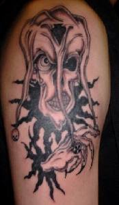 手臂黑白小丑恶魔纹身图案
