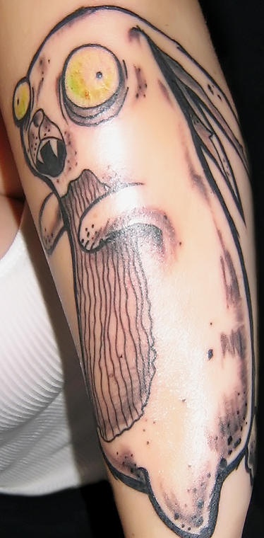 手臂上的僵尸兔纹身图案
