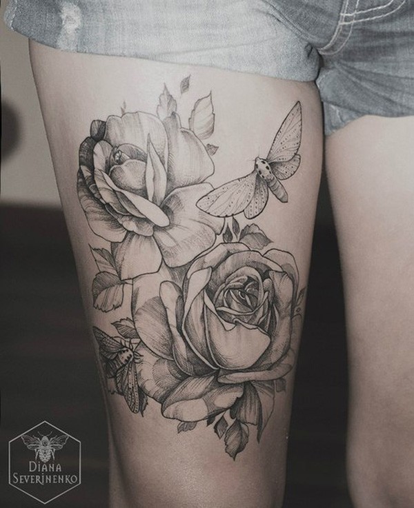 女性腿部黑灰植物纹身图案