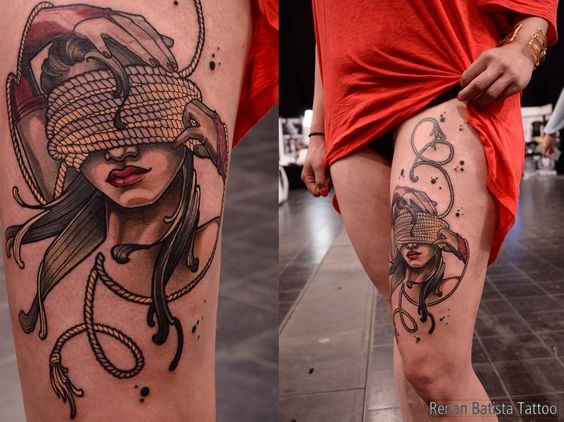 腿部蒙眼睛的女人纹身图案