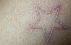 白色小星星纹身图片