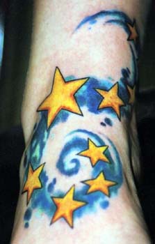 手臂彩色银河与星星纹身图案