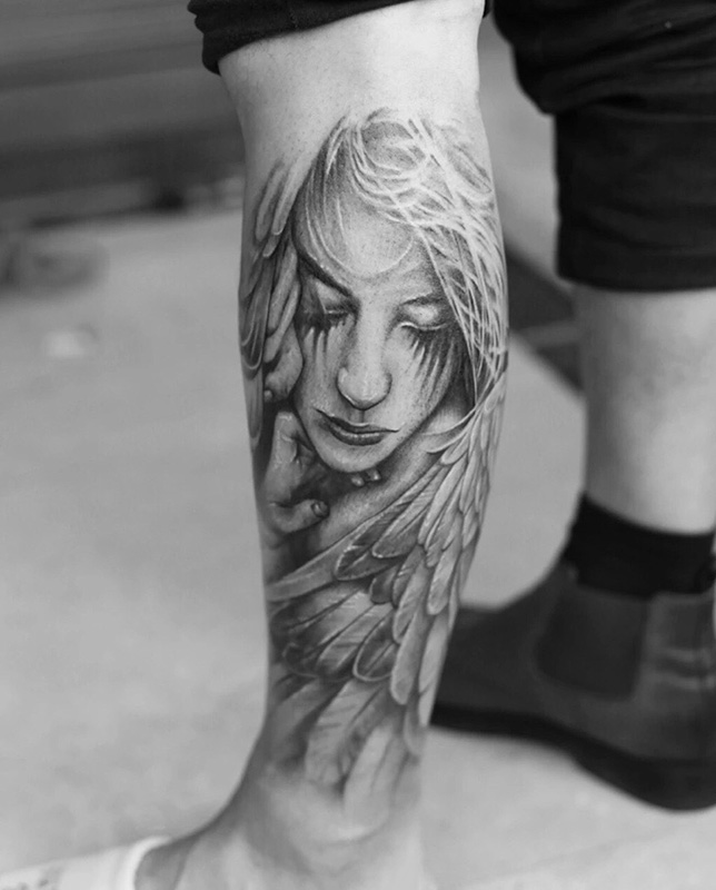 小腿唯美哀伤的天使纹身图案