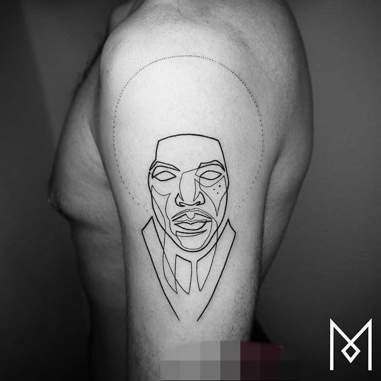 手臂上黑白几何元素简单个性线条人物肖像纹身图片
