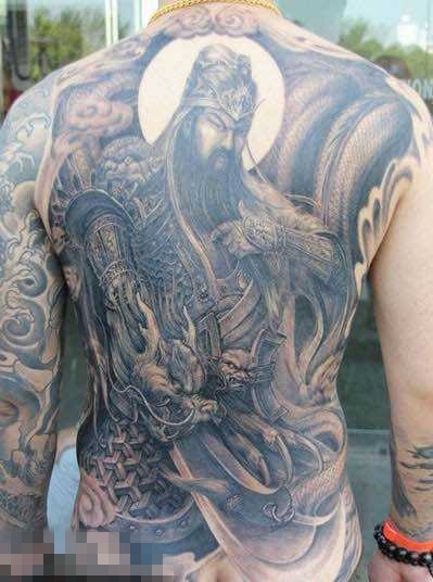 勇猛威武的黑色点刺抽象线条人物肖像关公纹身图案