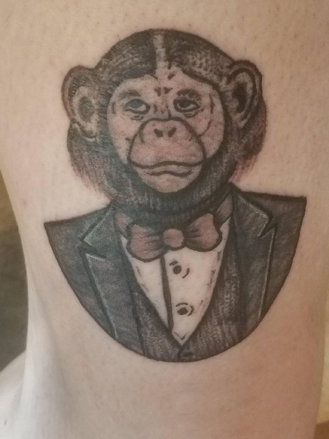 男生小腿上黑色点刺几何线条小动物猴子纹身图片