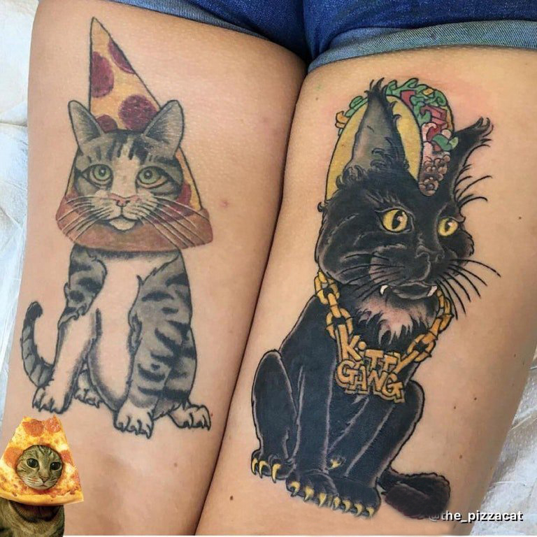 女生大腿上彩绘简单线条创意小动物猫咪纹身图片