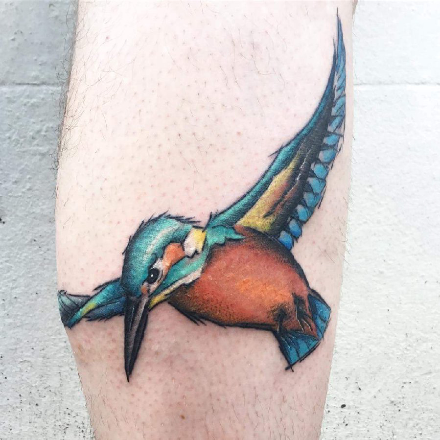 男生小腿上彩绘简单线条小动物鸟纹身图片