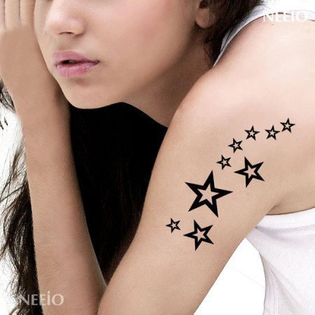 女生手臂上黑色线条创意文艺星星纹身图片