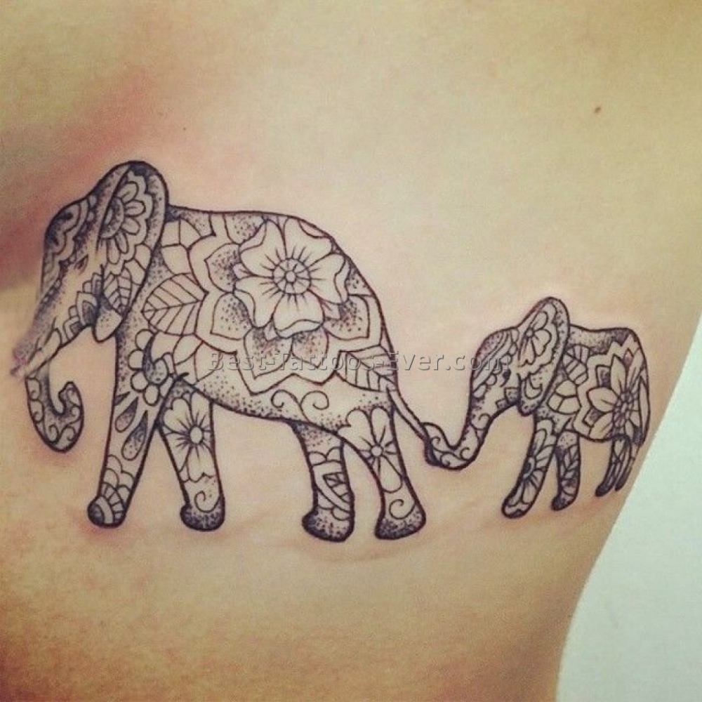 女生侧腰上黑灰素描点刺技巧创意花纹大象纹身图片